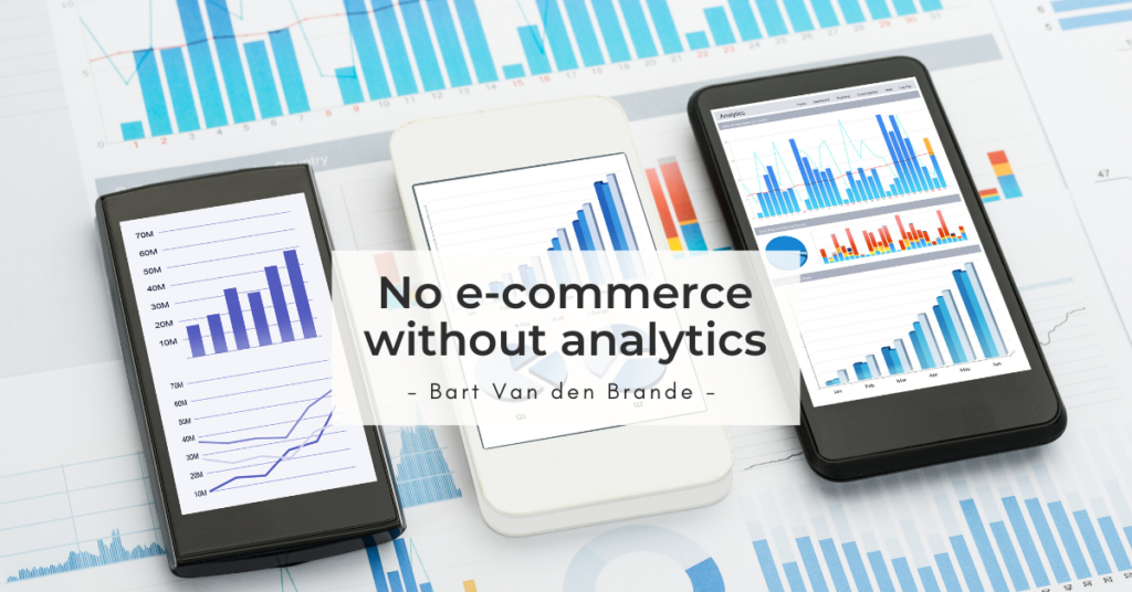 Three smartphones displaying analytics graphs on a table with printed charts in the background.