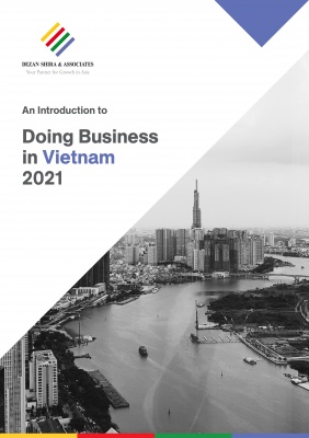 Report titled "An Introduction to Doing Business in Vietnam 2021" with cityscape and river view in background.