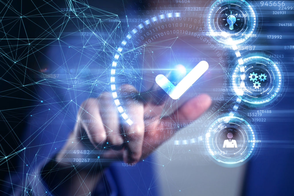Hand pressing a digital screen with icons representing innovation, management, and success in a legal or business context.
