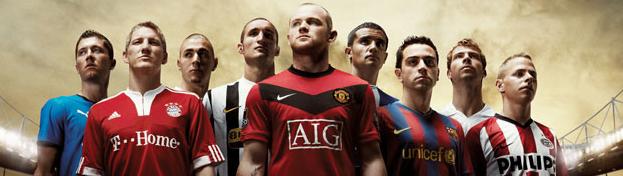 Group of male soccer players in jerseys, standing together against a dramatic background.