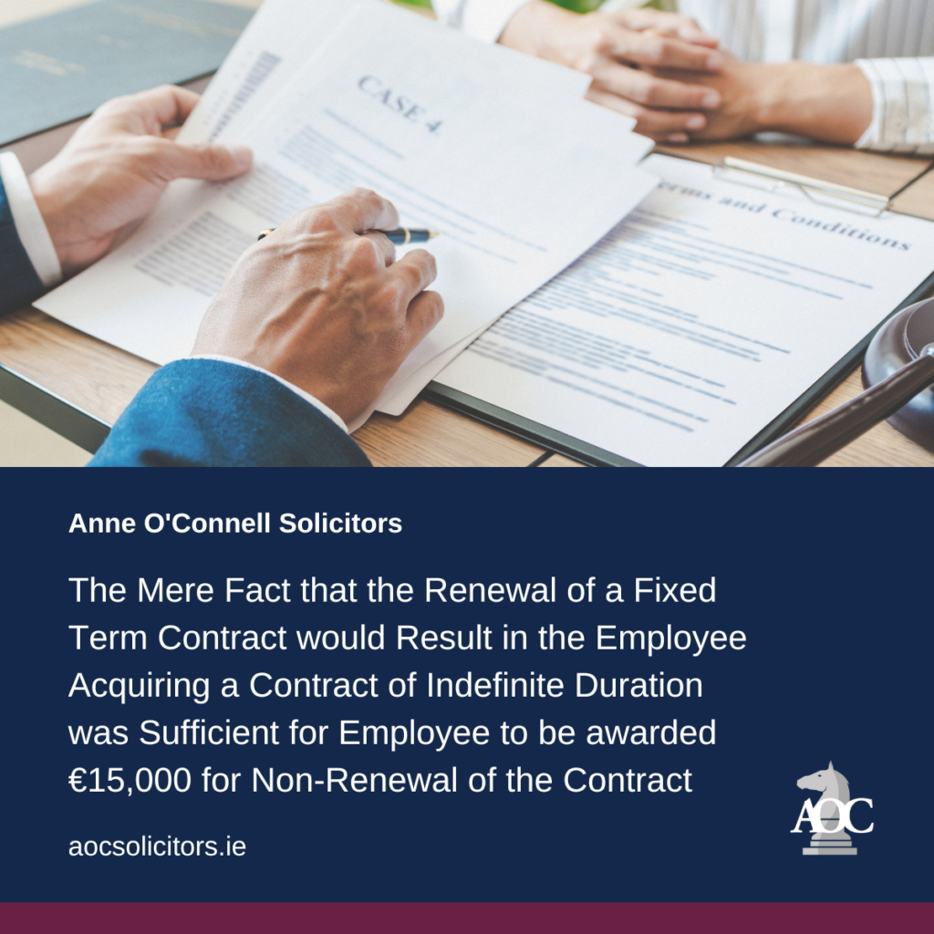 Attorney reviewing case documents while consulting with a client in a law office setting.