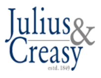 Logo of Julius and Creasy law firm, established in 1849, featuring blue and gray text.
