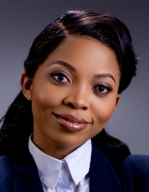 Professional woman in business attire, presenting a confident expression, suitable for a legal context.