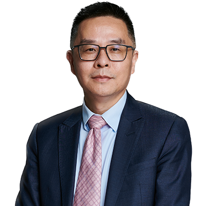 Attorney in a suit and tie, looking directly at the camera with a neutral expression.