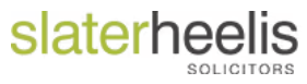 Legal firm logo for Slater Heelis Solicitors, featuring their name in modern typography.