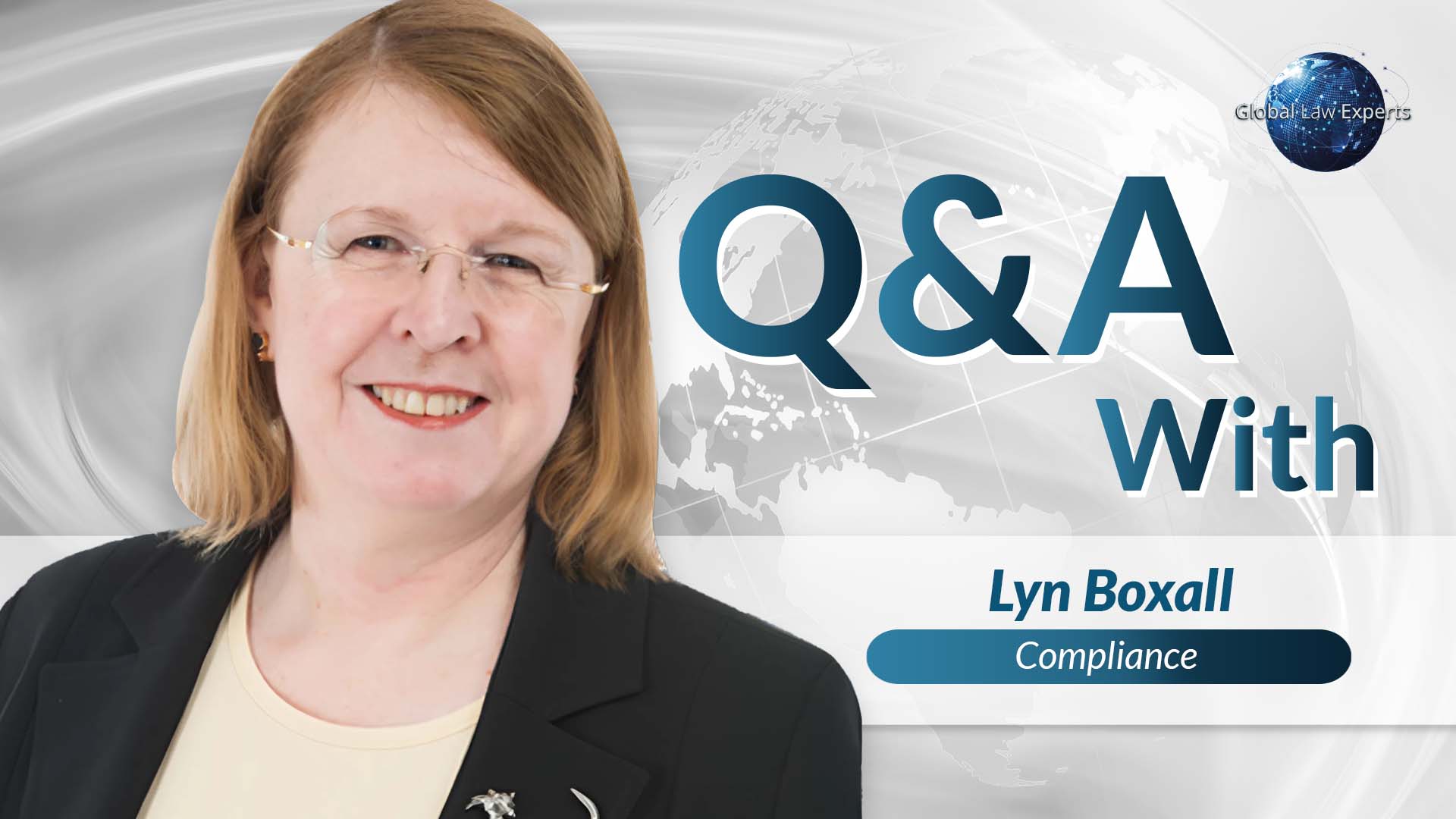 Legal professional providing insights on compliance in a Q&A format, with a globe and legal references in background.