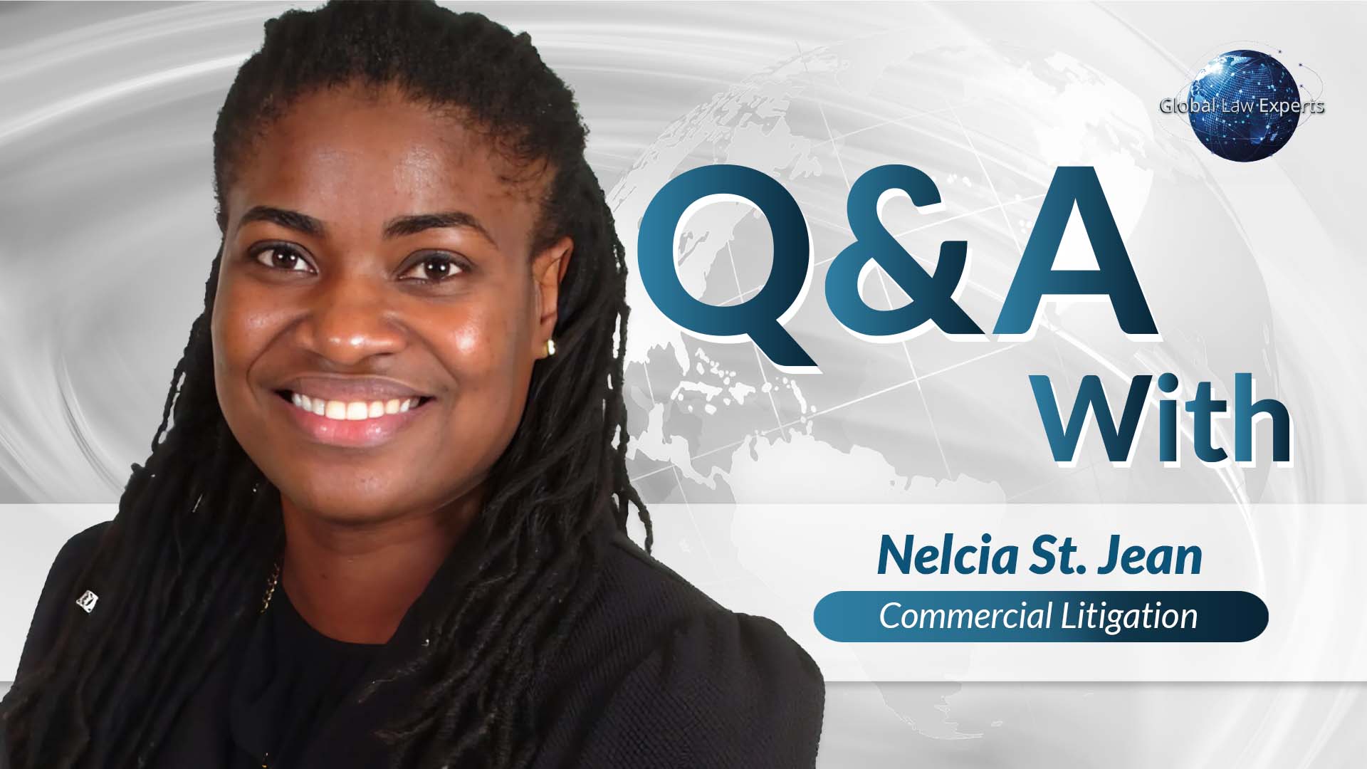 Legal professional smiling, identified as Nelcia St. Jean, specializing in commercial litigation.