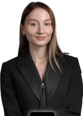 Lawyer in professional attire posing confidently for a portrait.