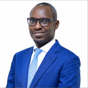 Attorney in a blue suit and glasses smiling against a plain white background.