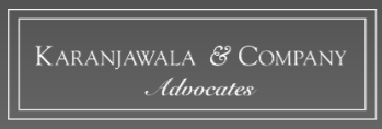Karanjawala & Company Advocates logo displayed on a gray background.