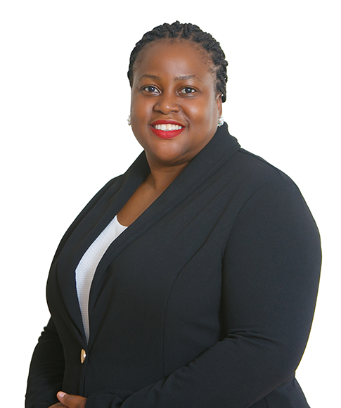 Lawyer posing confidently in professional attire with a welcoming smile against a plain background.