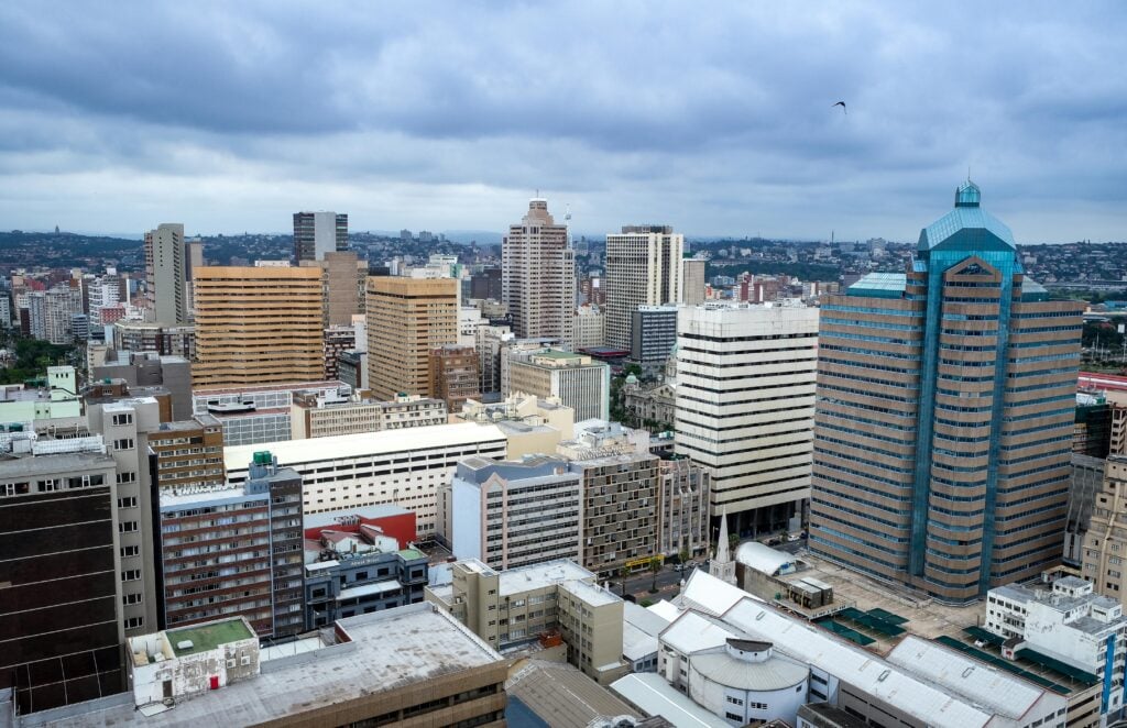 City skyline with modern high-rise buildings, showcasing a metropolitan area.