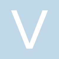 Legal professional discussing case details with client in modern law office setting.