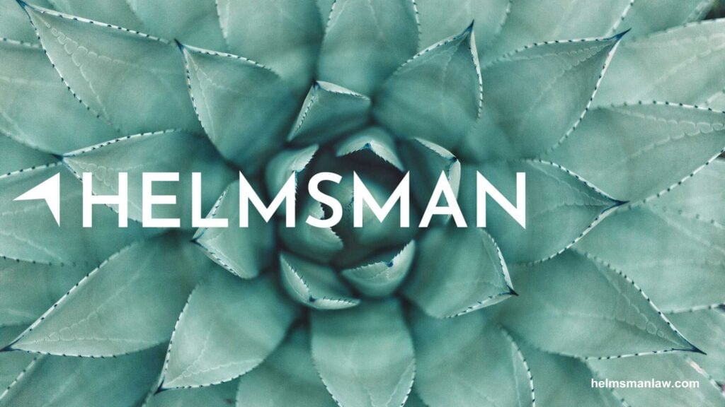 Succulently designed plant with shades of green and the text "HELMSMAN" prominently displayed in white.