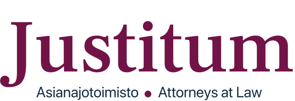 Logo of Justitum, a legal services firm, featuring the name and "Attorneys at Law" in a stylized font.