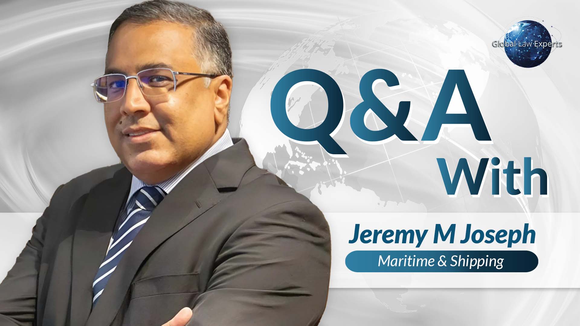 Maritime attorney posing confidently, with a global map background, for a Q&A session on shipping law.